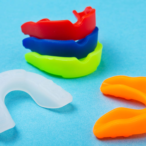stack of colorful mouthguards