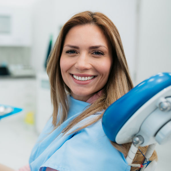 woman smiling in dental chair