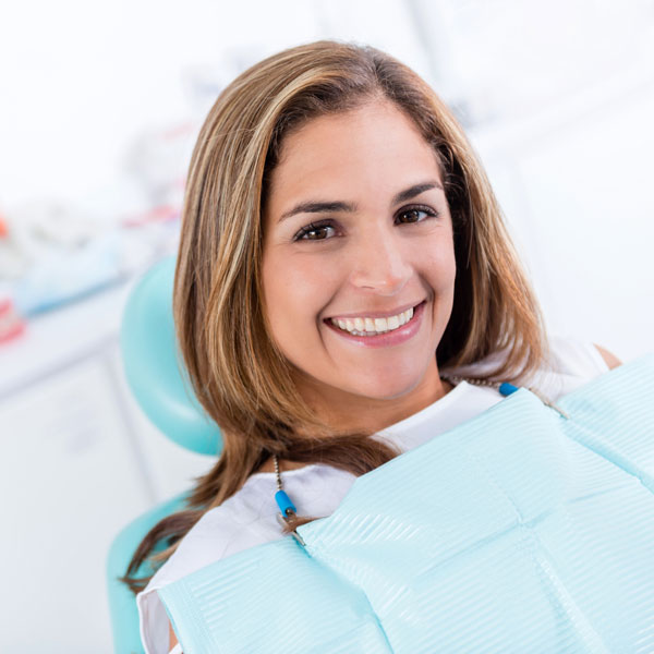 woman smiling in dental chair